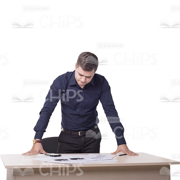 Discouraged Businessman Standing Next To A Table-0