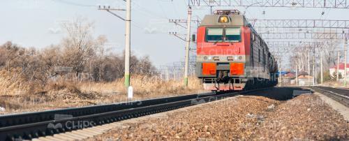 Stock Photo Of Electric Locomotive Hauling Freight Train-0