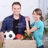 Smiling Young People With Cardbox Stock Photo