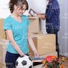 Young Woman Puts Her Things Into Cardbox Stock Photo
