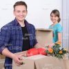 Stock Photo Young Couple Moving to New Home