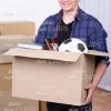 Happy Man Holds Large Cardboard Box Stock Photo