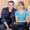 Young Couple Sitting on Floor Stock Photo