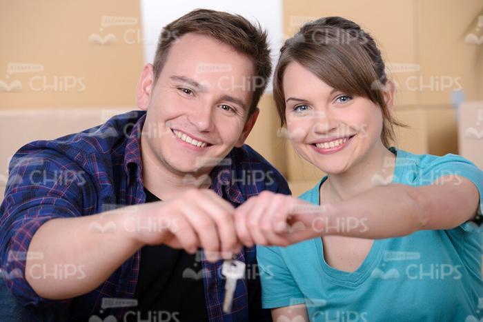 Nice Young Couple With Keys Stock Photo