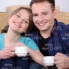 Happy Young People With White Cups Stock Photo