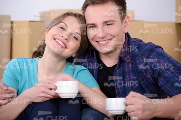 Happy Young People With White Cups Stock Photo