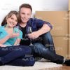 Young Couple Ready To Move To The New House Stock Photo