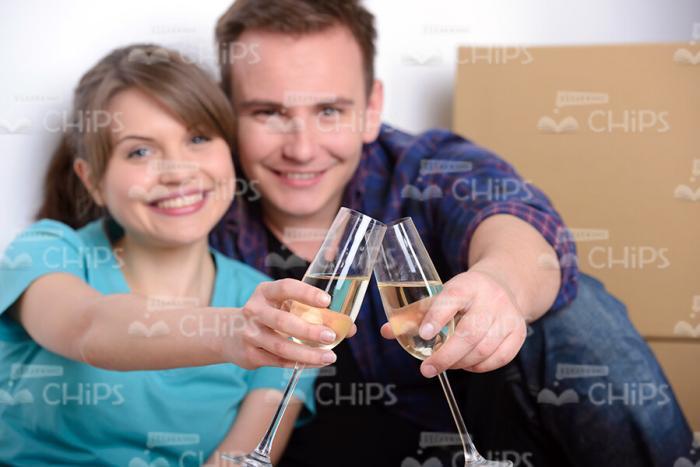 Married Couple Celebrating Moving Into New Apartments Stock Photo