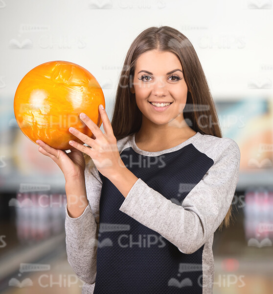 Happy Girl Holding Bowling Ball Stock Photo