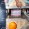 Girl Playing Bowling Stock Photo