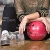 Close Up Of Woman's Hands On Bowling Ball Stock Photo