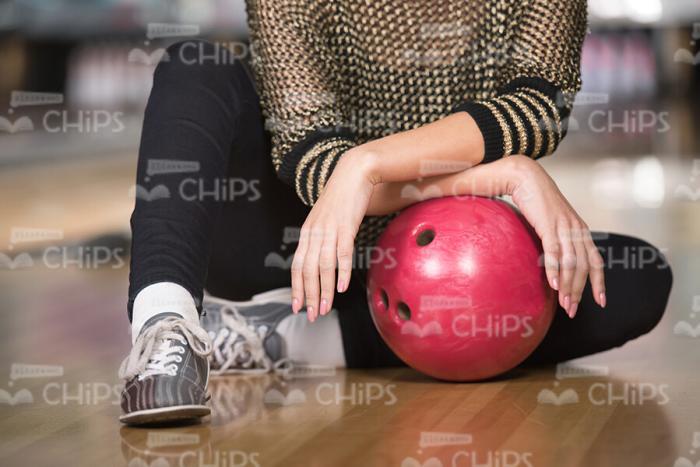 Close Up Of Woman's Hands On Bowling Ball Stock Photo