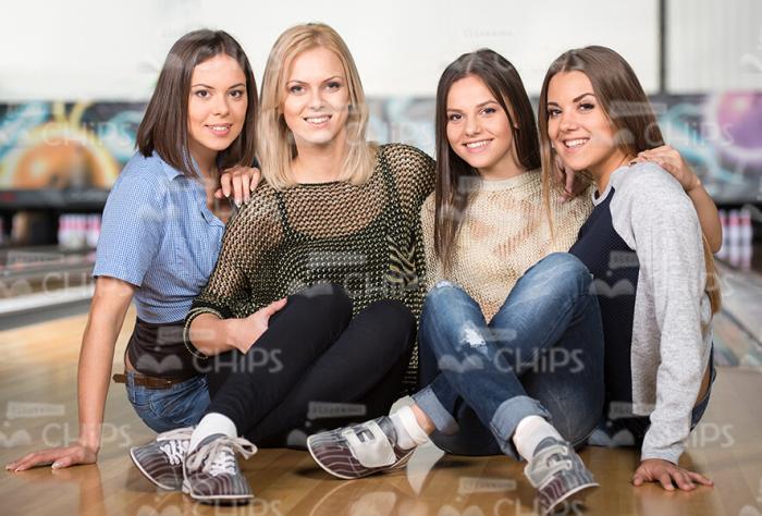 Four Friendly Women At Bowling Alley Stock Photo
