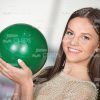 Handsome Woman Holds Green Bowling Ball Stock Photo