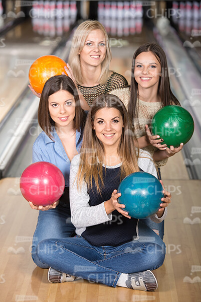 Nice Girls Holding Bowling Balls Stock Photo