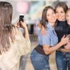 Woman Taking Photo Of Her Friends Stock Photo