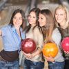 Female Friends Resting At Bowling Stock Photo