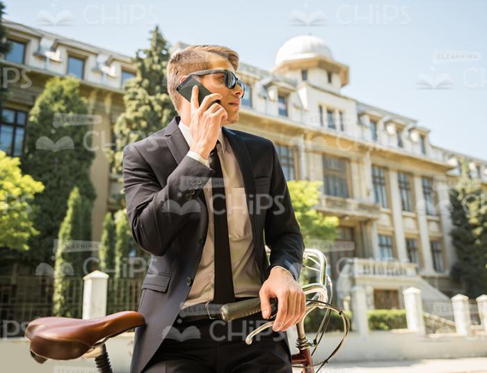 Young Businessman Talking On Mobile Phone Stock Photo