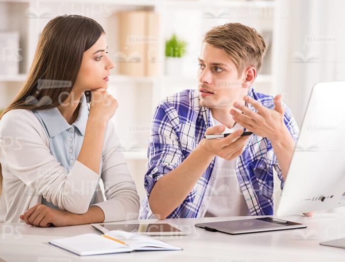 Two Young Students Talking Stock Photo