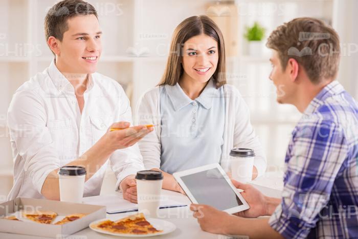Young People On Training Session Having Coffee Break Stock Photo