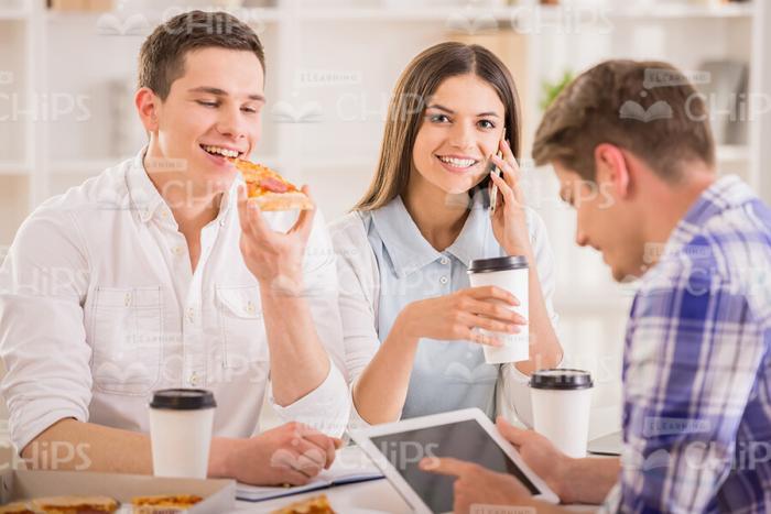 Young Students Having Lunch Time Stock Photo