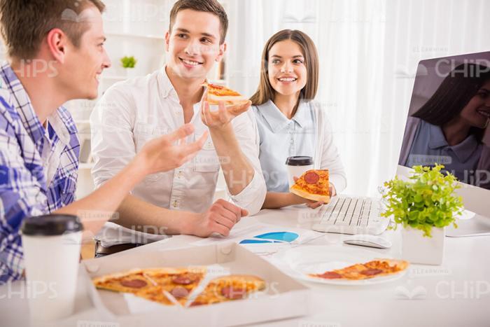Conversation During Eating Pizza Stock Photo