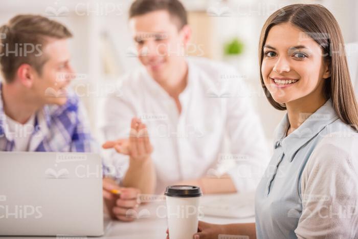 Young Lady Holding Coffee Cup Stock Photo