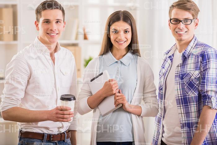 Three Handsome Young People On Training Stock Photo