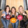 Top View On Three Satisfied Women At Bowling Alley Stock Photo