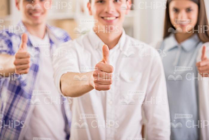 Hands Making Thumbs Up Gestures Stock Photo