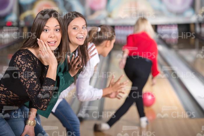 Girl Is Throwing The Bowling Ball Stock Photo