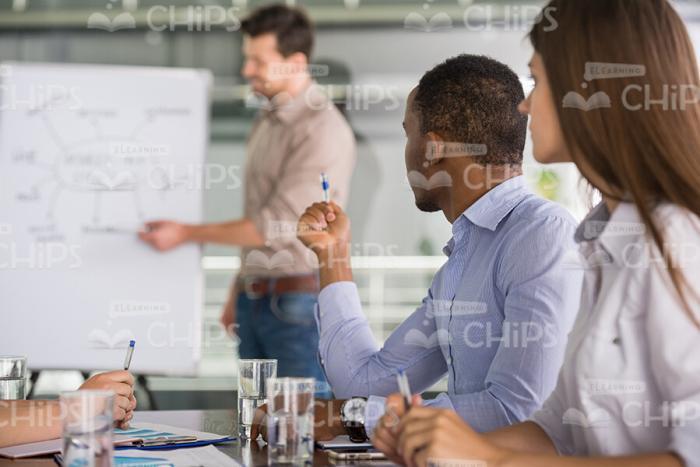 Young Man Wants To Ask Question On Training Stock Photo