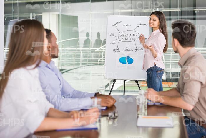Young Girl Holding Business Meeting Stock Photo
