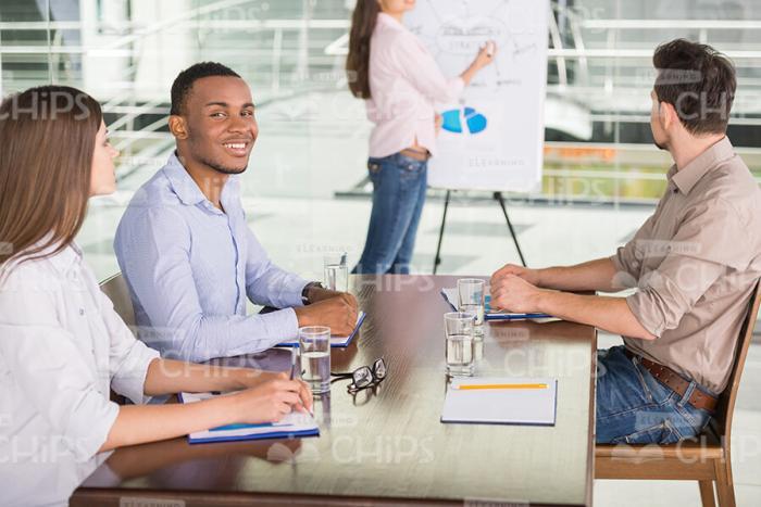 Young Listeners On Business Meeting Stock Photo