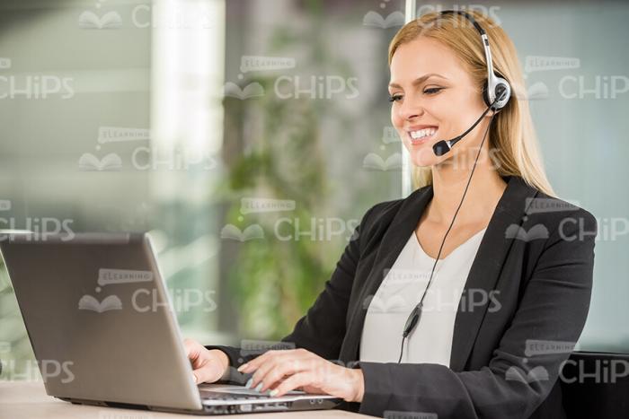 Young Businesswoman Working On Laptop Stock Photo