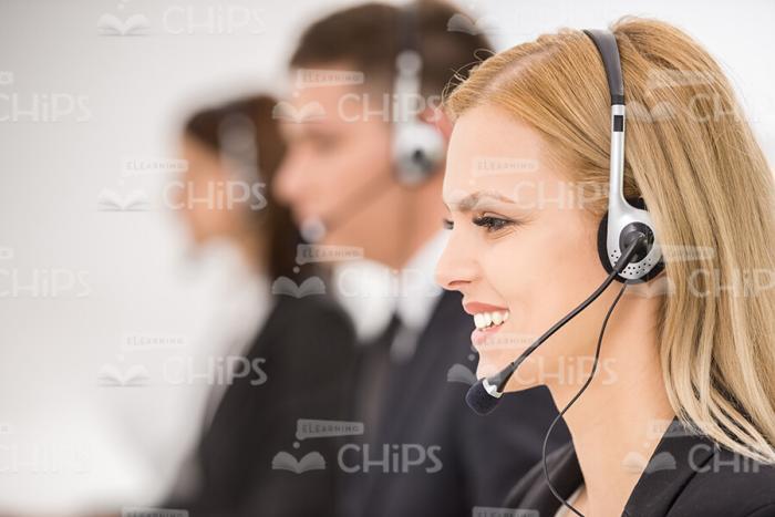 Young People Working In Call Center Stock Photo