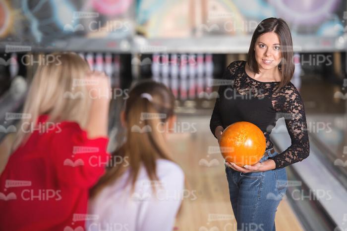 Glad Young Lady At Bowling Alley Stock Photo
