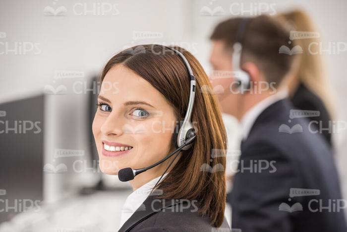 Female Call Canter Worker With Headset Stock Photo