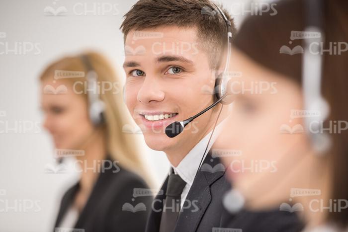 Handsome Business Adviser Wearing Headset Stock Photo