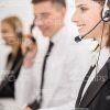 Profile View Of Young Businesswoman Wearing Headset Stock Photo