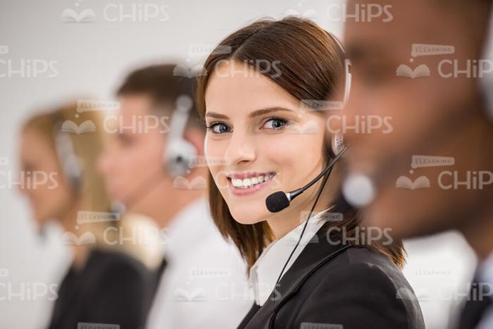 Pretty Female Call Center Operator Stock Photo