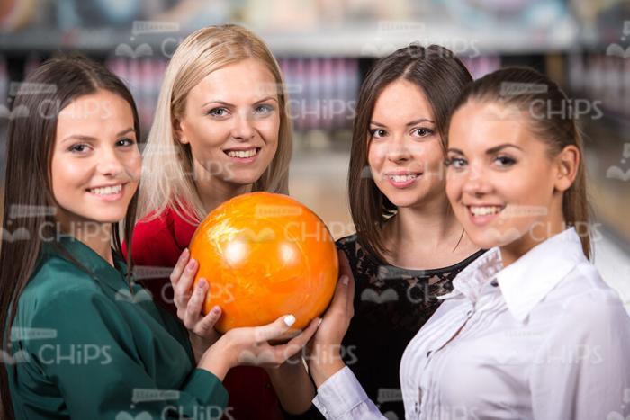 Handsome Women With Orange Bowling Ball Stock Photo