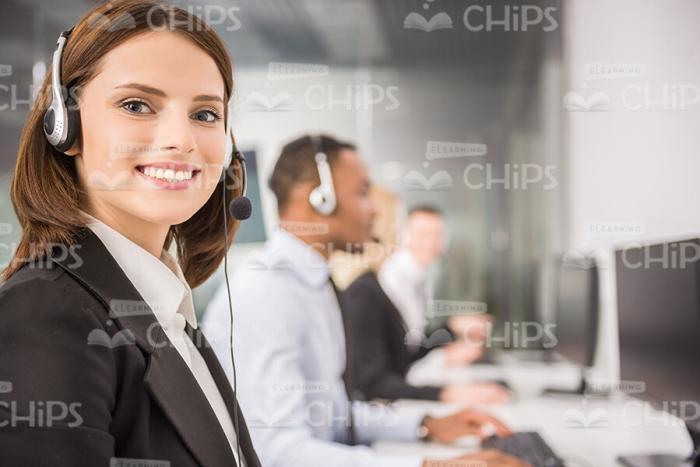Young Woman Wearing Headset Stock Photo
