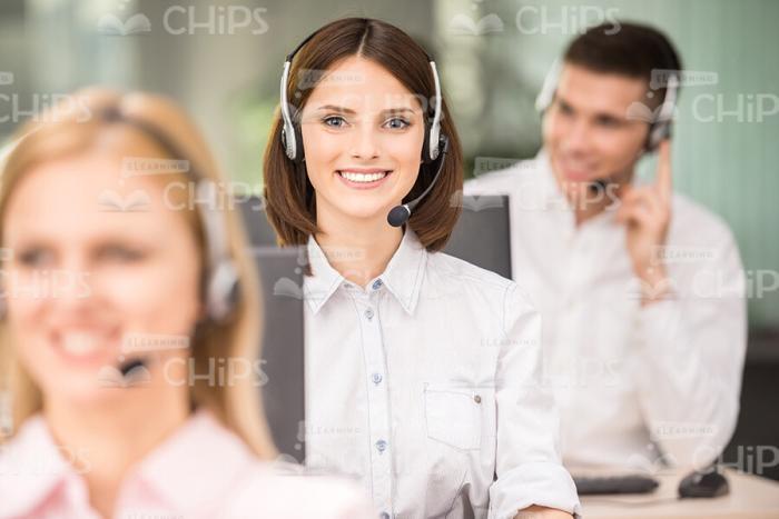 Young Lady Working In Call Center Stock Photo
