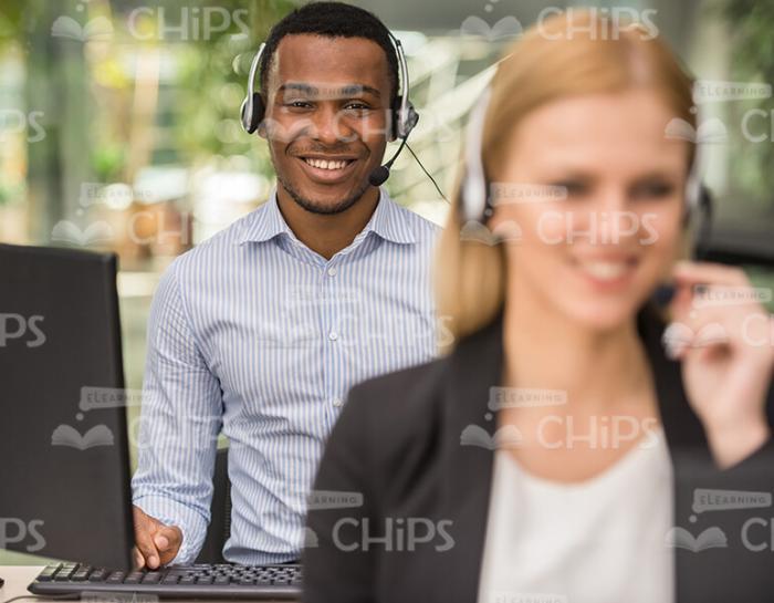 Call Center Operators Working At Office Stock Photo