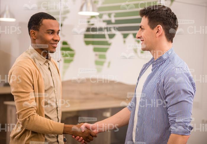 Two Handsome Guys Shaking Hands Stock Photo