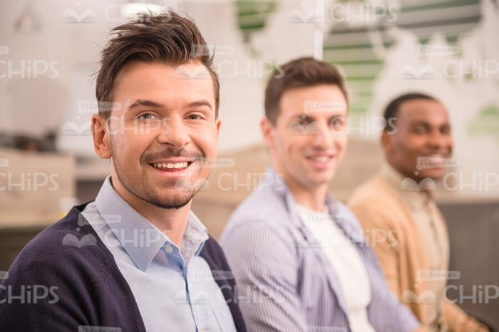 Bearded Man Smiles At Camera Stock Photo