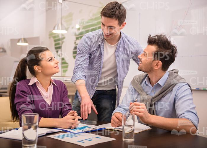 Two Men And Woman Talking On Training Stock Photo