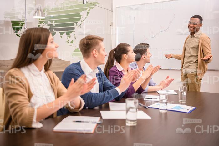 Students Applauding To Lecturer Stock Photo