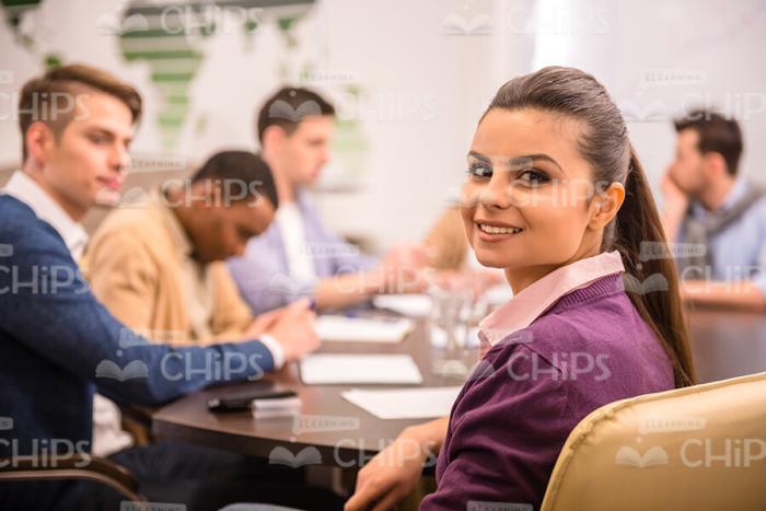 Smiling Woman On Business Meeting Stock Photo